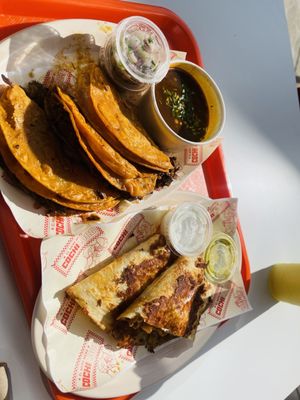 Cochiloco signature dishes Birria Tacos, Pork Belly Tacos, Fried Chicken Tacos, Street Corn